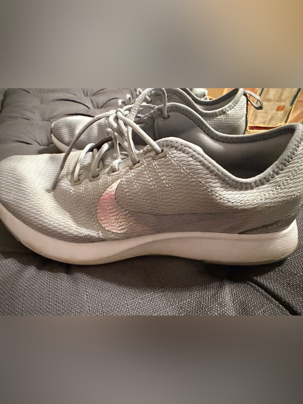 Nike Women’s Light Gray Athletic Sneakers with Pink Swoosh
